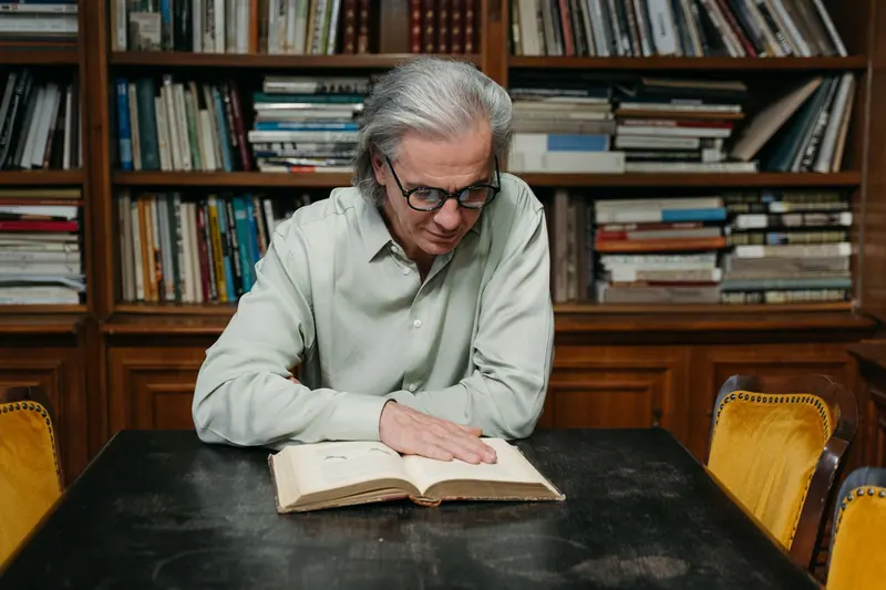 A resident reading in the library