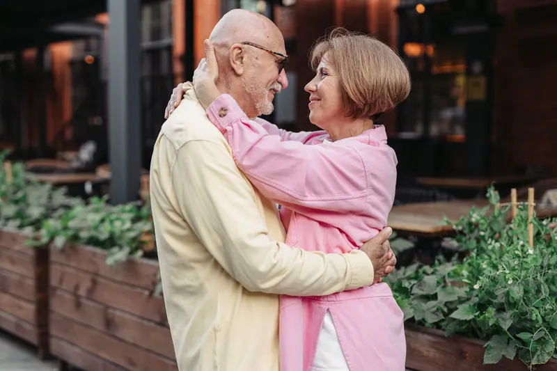 A couple dancing on the patio
