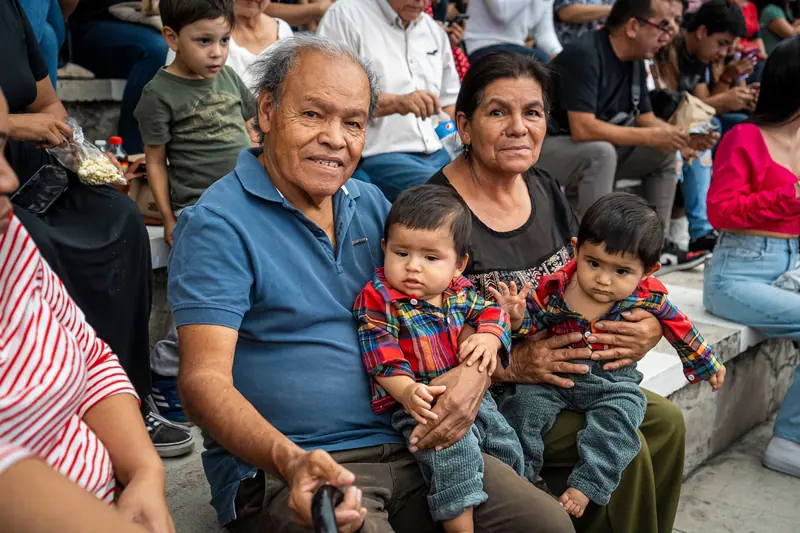Grandparents with grandkids on their laps