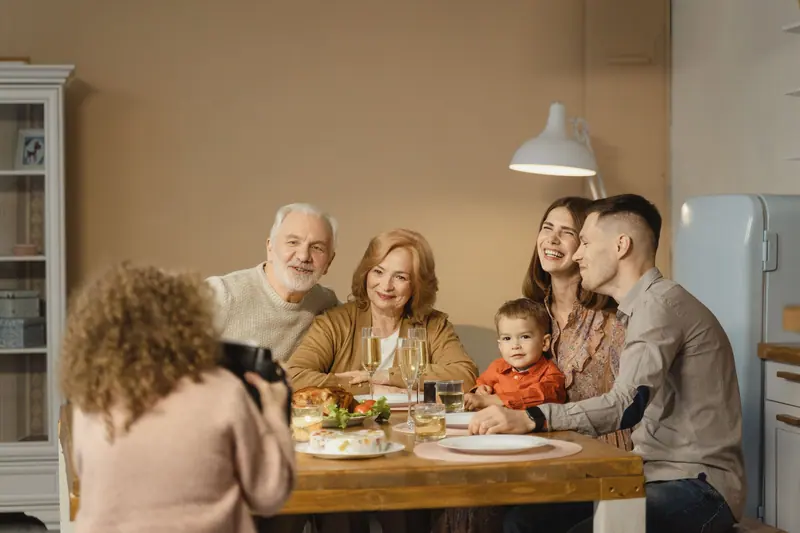 A family celebrating together around the dinner table