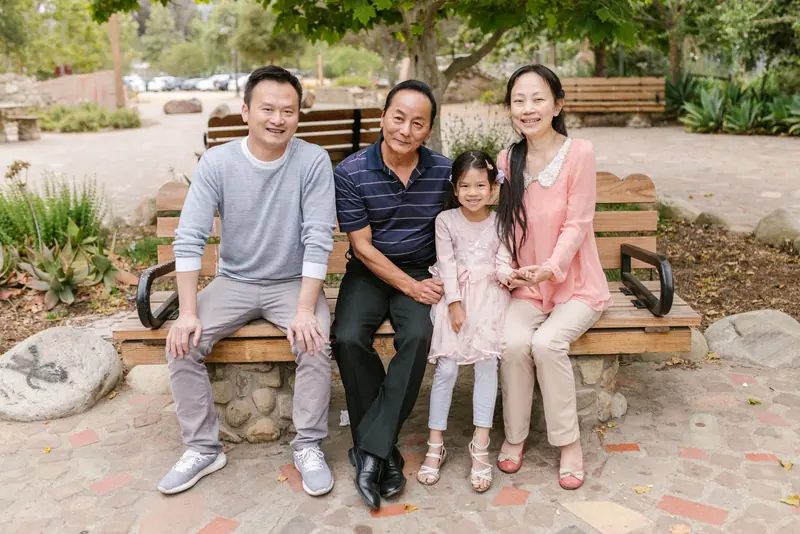 A family portrait on the front porch