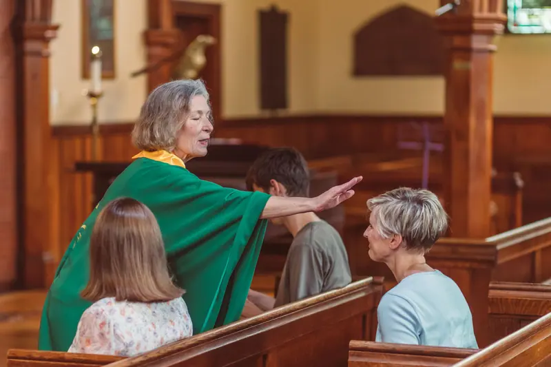 A minister offering a blessing