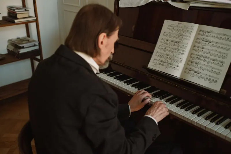 A volunteer playing hymns at the piano