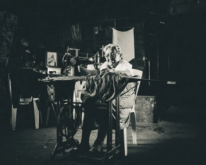 A resident at the treadle sewing machine
