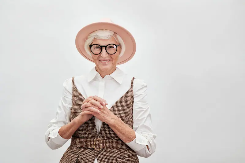 A resident in a hat and glasses