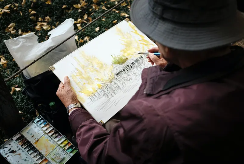 A resident sketching the trees during a weekly sketch walk