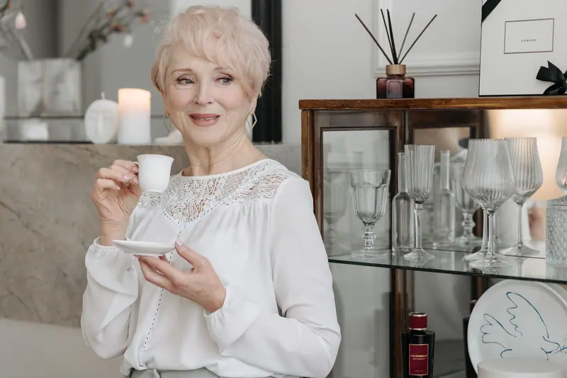 A resident enjoying her afternoon tea
