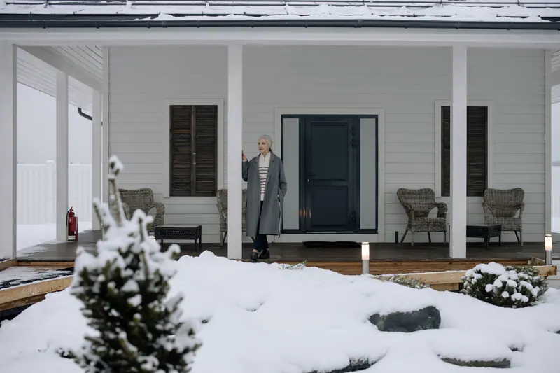 The porch dusted with snow