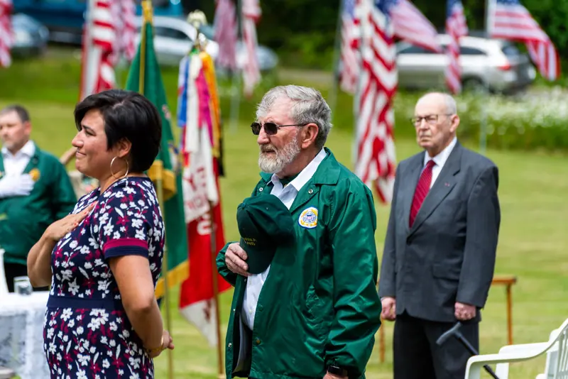 Veterans and families at a memorial ceremony