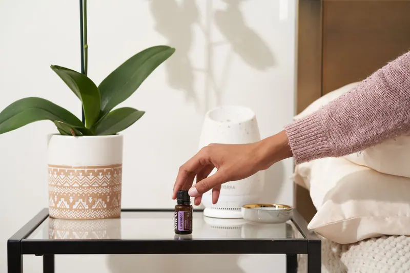 An aroma diffuser being set on the night table