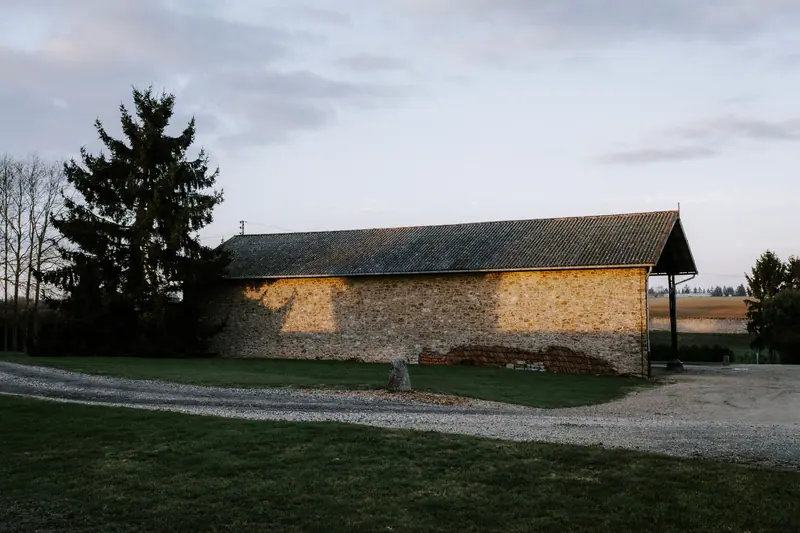 The old limestone barn at the back of the property