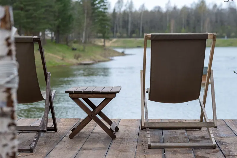 Deck chairs set out on the lakeside lawn