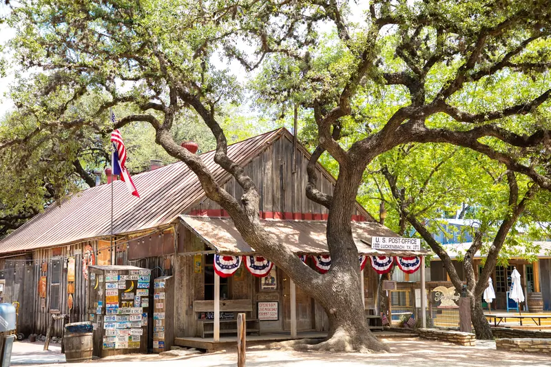 An old general store under live oaks, a short drive from the Terrace