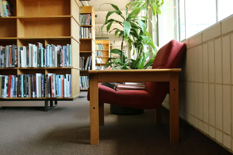 A reading desk by the window in the library