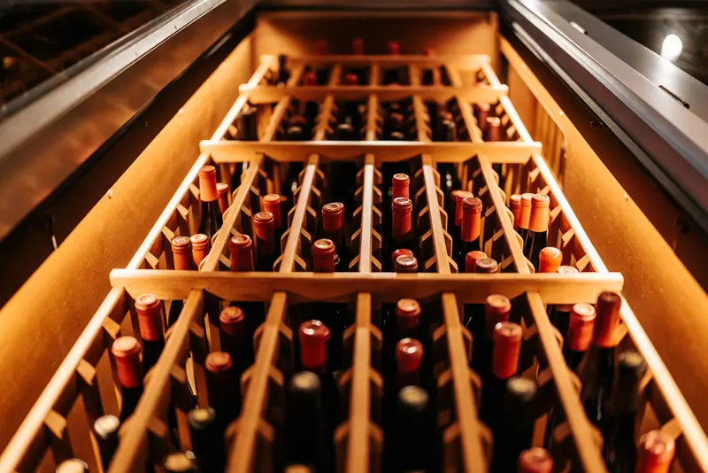 The cellar racks glowing amber