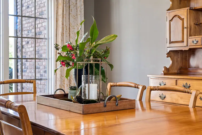 A bouquet on the polished dining table