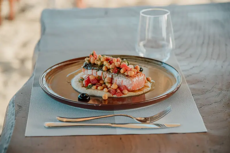 Salmon with garden tomatoes at supper