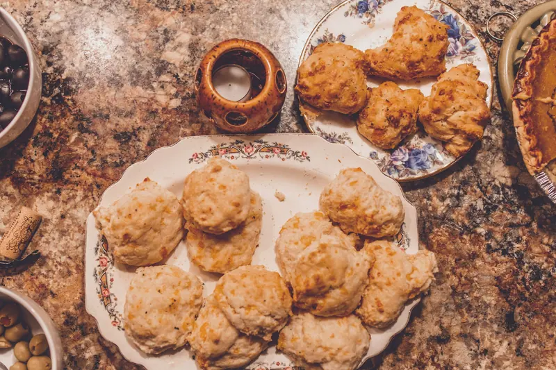 Fresh biscuits on a floral plate at breakfast