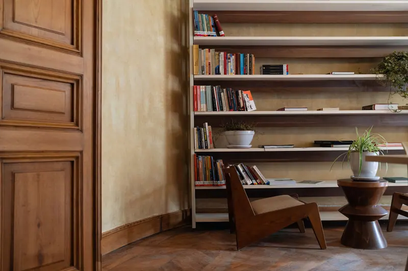 Built-in bookshelves on the stair landing
