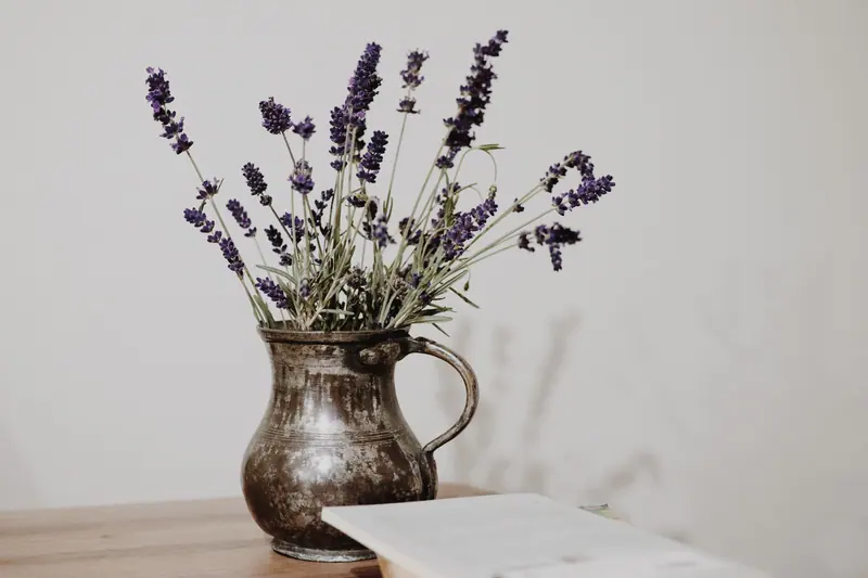 A pitcher of lavender on a Farmhouse table