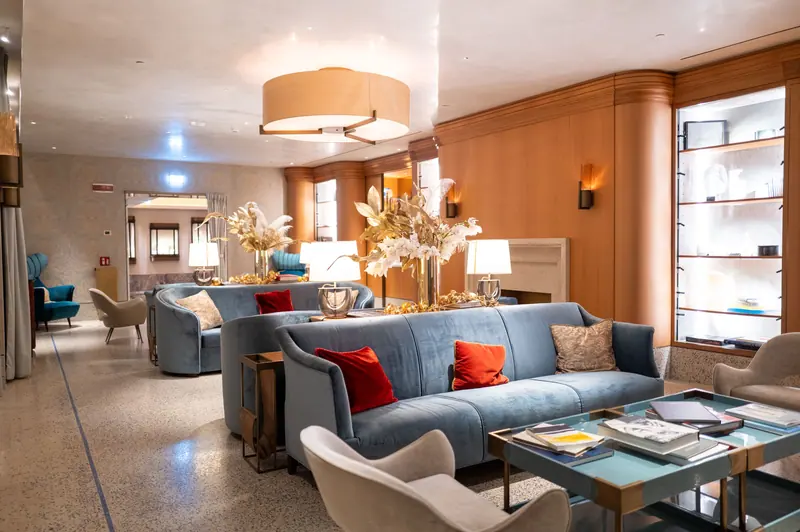 The second-floor salon with its blue sofas