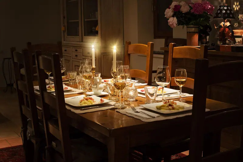 Candles lit and the long table set for Sunday supper