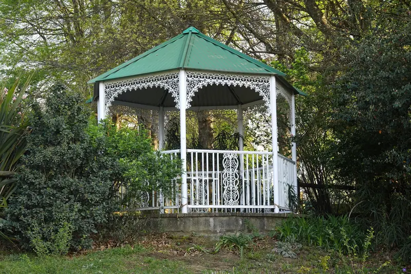 The white gazebo in the side garden