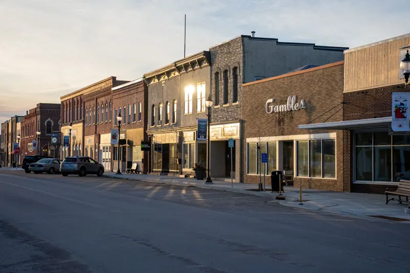 Main Street storefronts at dusk