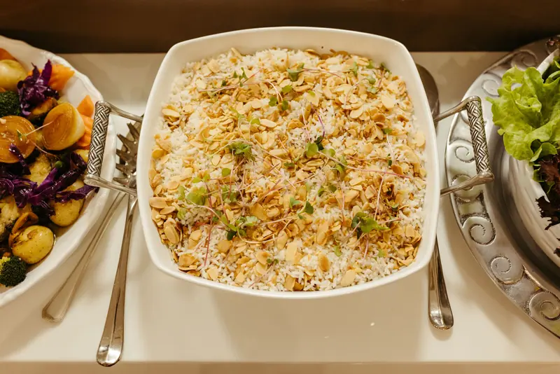 Rice and roasted vegetables served family style