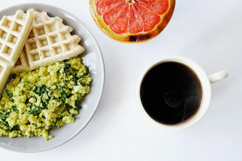 Waffles, eggs and coffee at brunch