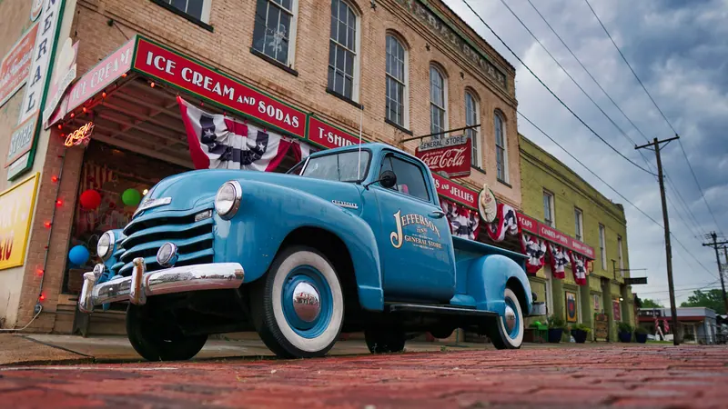 A vintage pickup outside the ice cream shop downtown