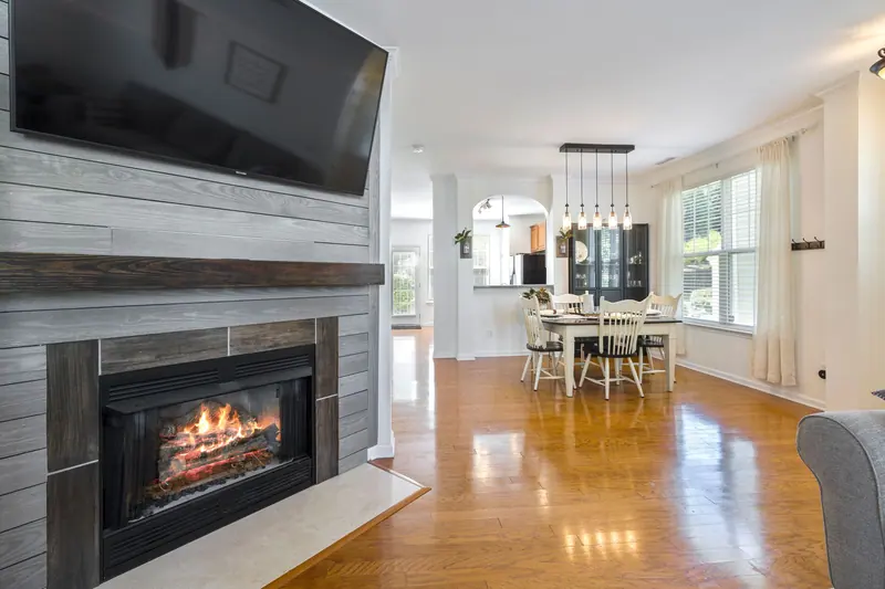 An open cottage kitchen and dining area
