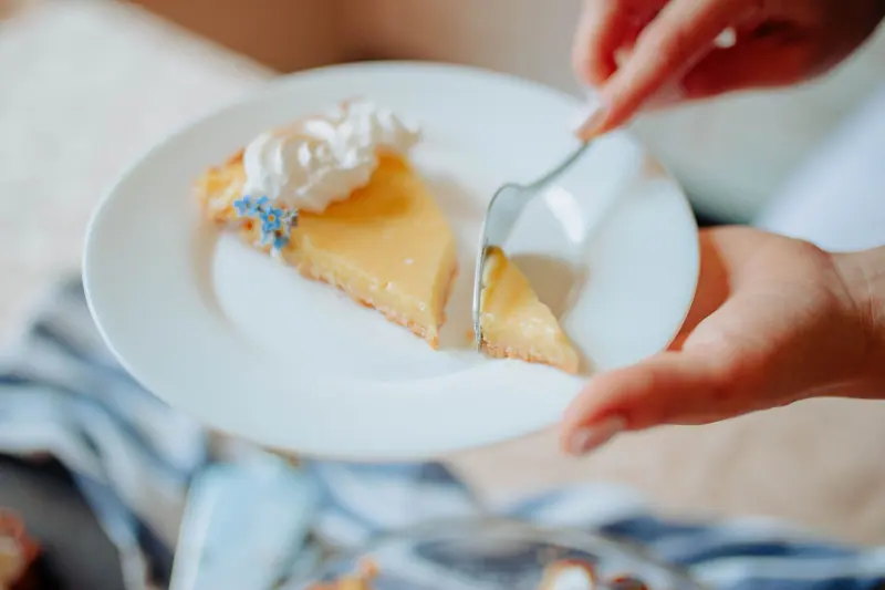 A slice of lemon tart served at tea