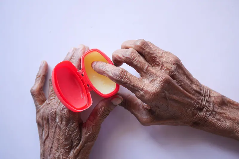 A guest practicing opening a jar to rebuild grip strength
