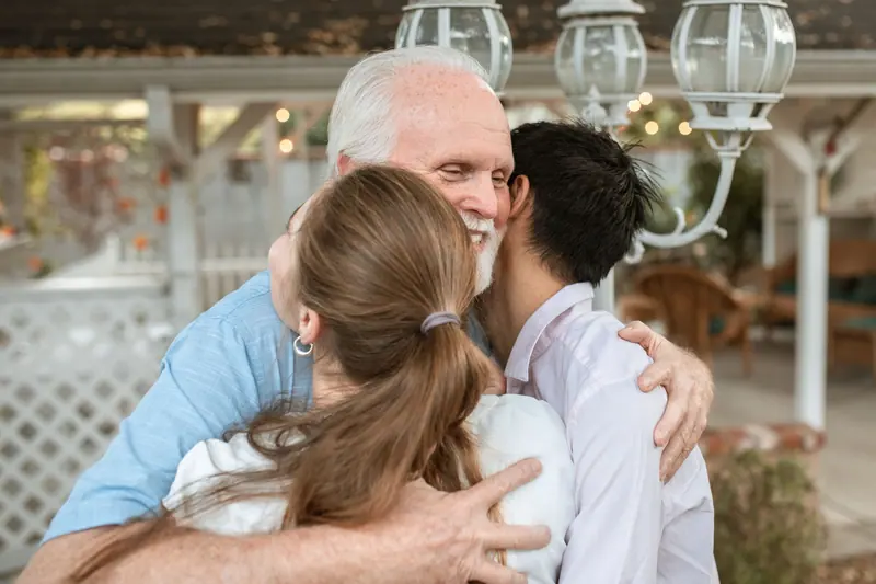 A guest hugging his therapist goodbye