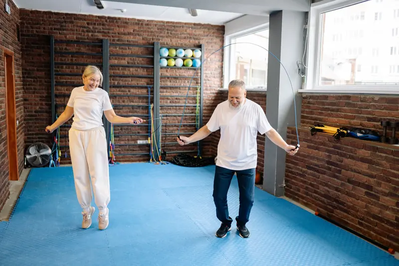 A couple doing side stretches on their mats