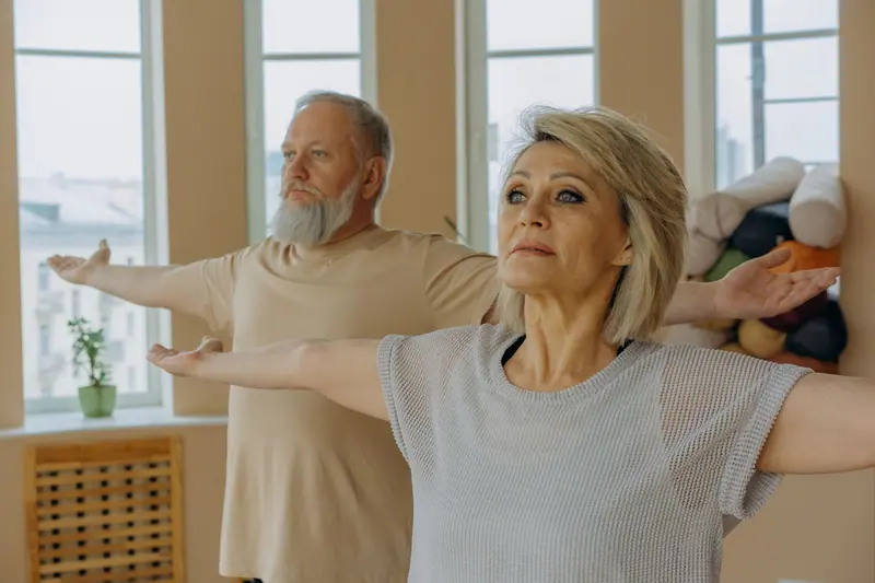 A couple stretching in the studio