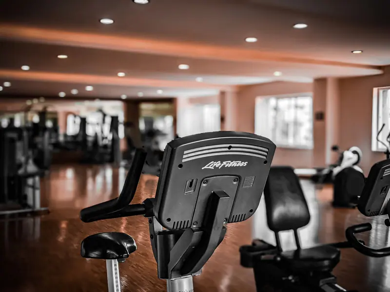 The cardio machines lined up in the gym
