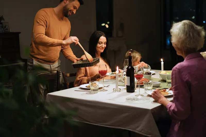Family gathered for a candlelit Sunday supper