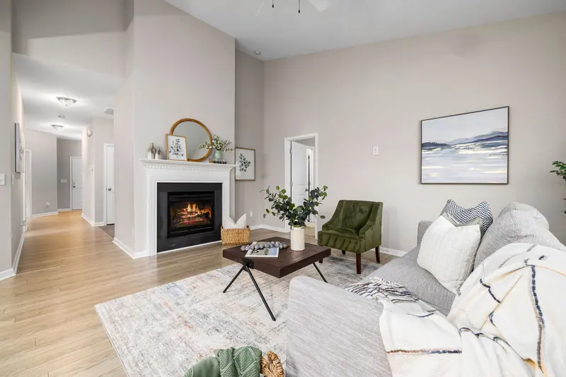 The family sitting room with a fireplace and soft couch