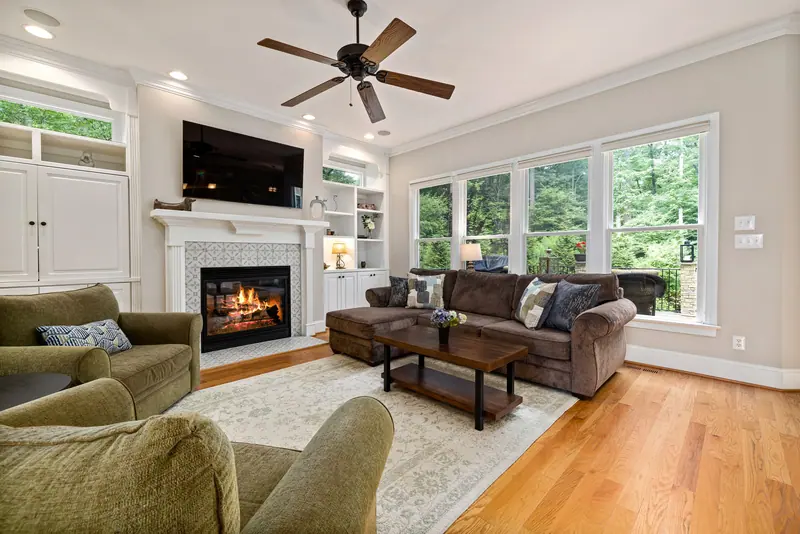 The fireplace lounge with sofas and big windows