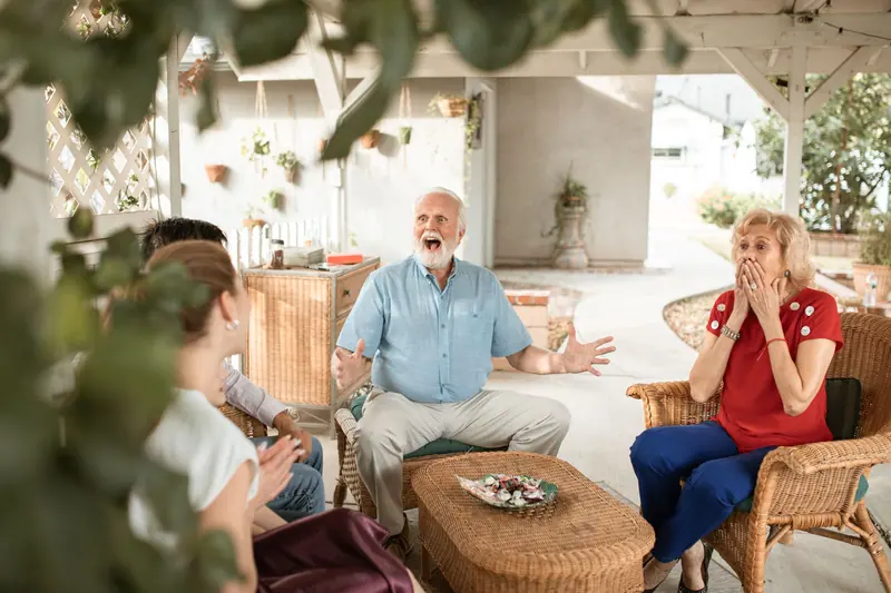 Residents trading stories on the back patio