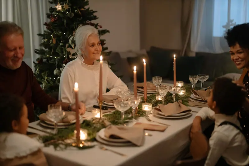 Families at the Christmas supper table