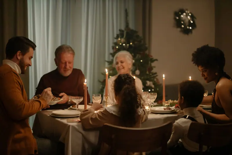 Christmas supper by candlelight with the family