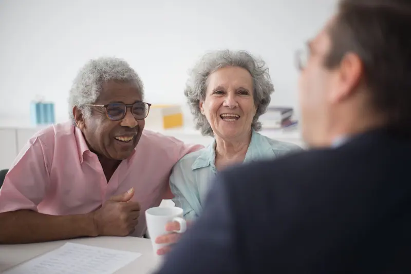 A resident couple meeting with our office about their service plan