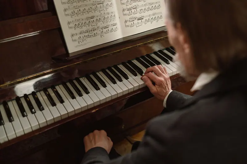 A resident playing the lobby piano