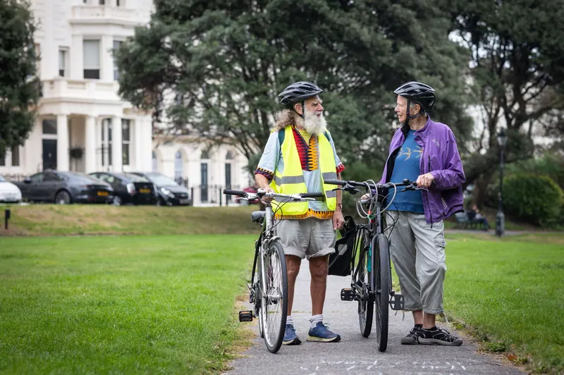 Two residents back from a ride on the shore trail