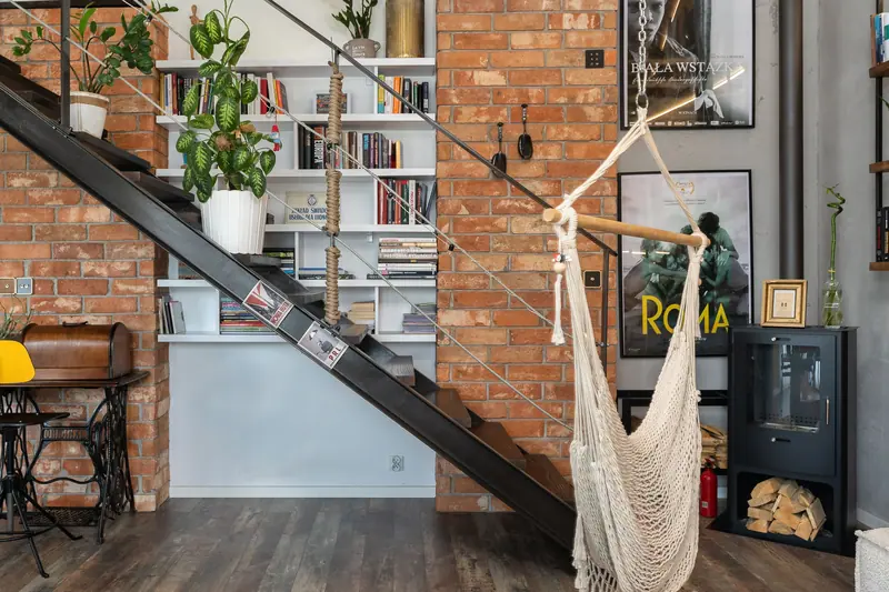 The steel staircase up to a two-story loft