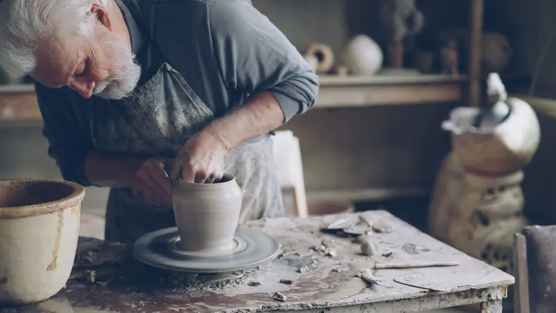 Shaping a jar for the market stall