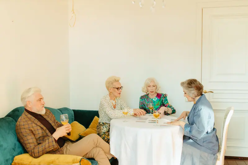 Residents lingering over coffee at the round table